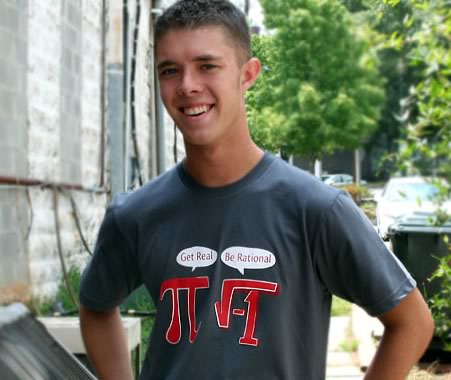 A t-shirt model wearing a shirt with a joke about Pi.